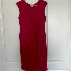 This CARMEN MARC VELVO red dress is fit for any party!